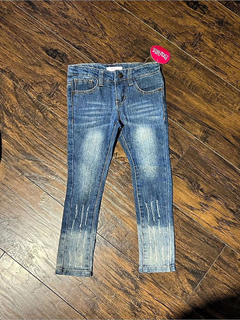 Pony Tails Distressed Blue Jeans